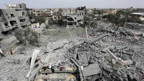 A view of damaged buildings at Maghazi refugee camp after Israeli attack in Deir al-Balah, Gaza on March 29, 2024.